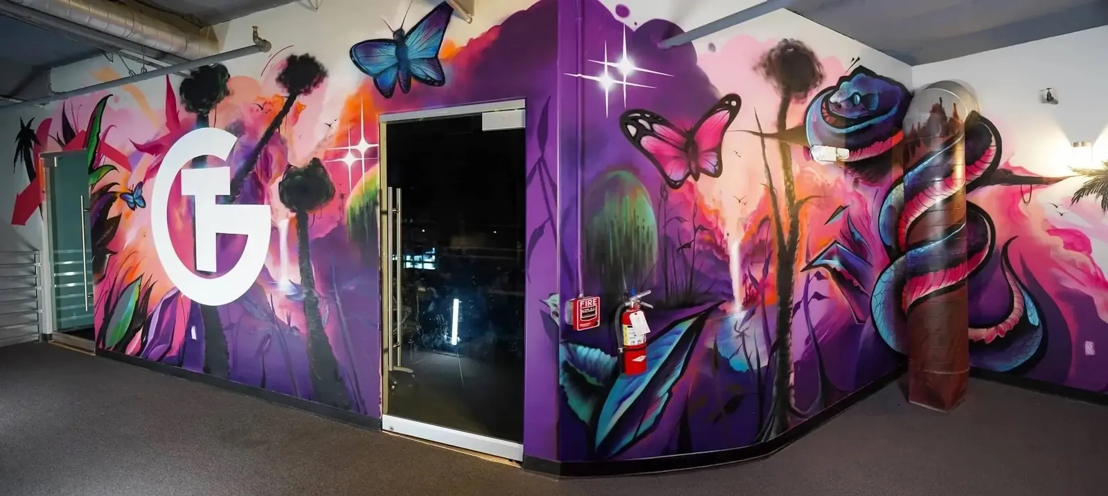 Immersive painted room revealed to guests at a party for The Gym