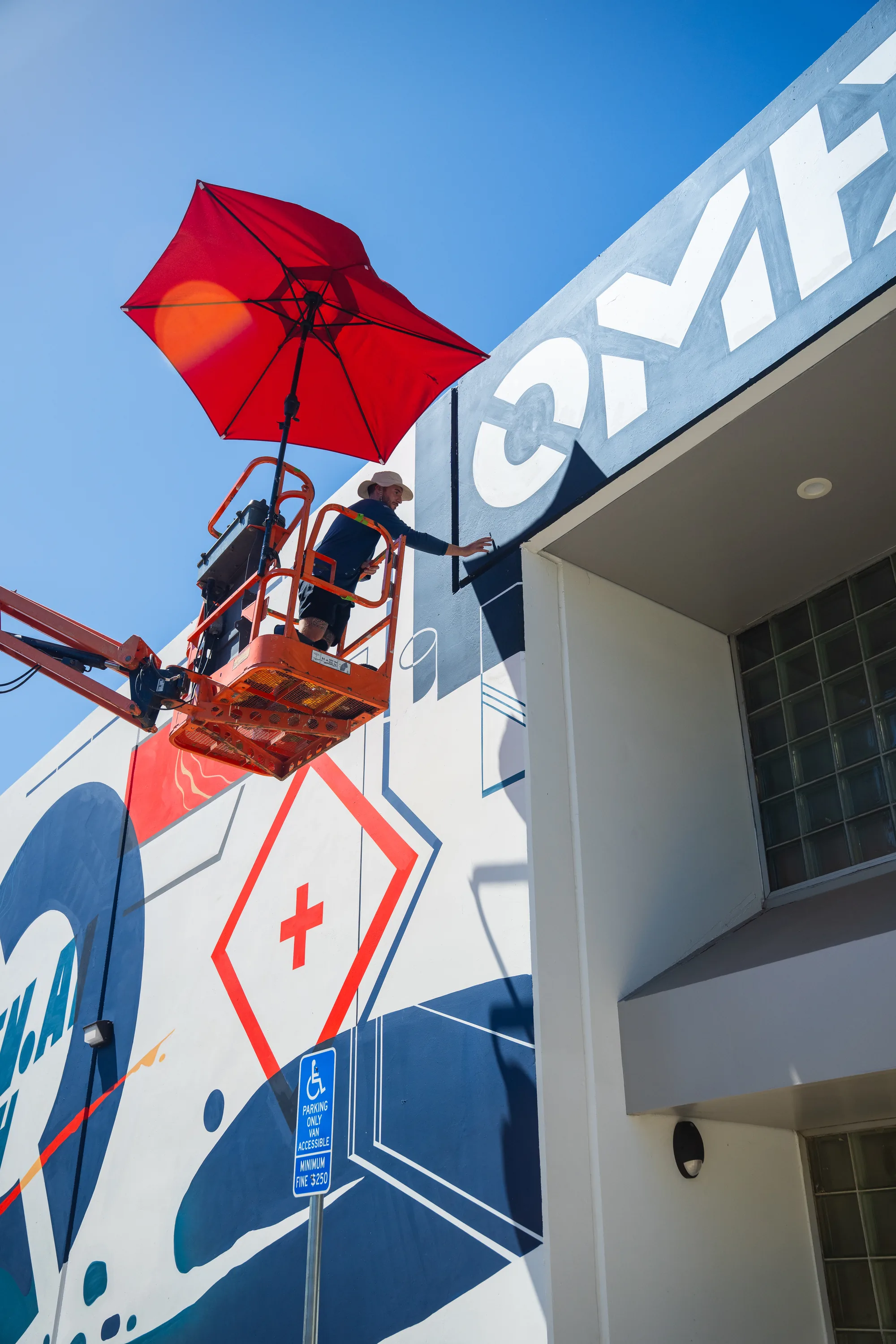 Close detail of the geometric lettering in the Omen AI mural